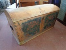 A 19th century hand painted pine dome topped shipping trunk