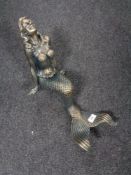 A 16" cast metal figure of a mermaid