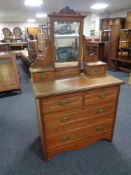 An Edwardian mahogany dressing chest