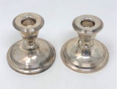 A pair of silver dwarf candlesticks, Chester 1915, height 7.