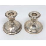 A pair of silver dwarf candlesticks, Chester 1915, height 7.