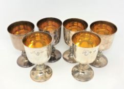 A set of six silver-gilt goblets, Reid & Sons, Birmingham 1976, height 13cm.