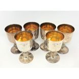 A set of six silver-gilt goblets, Reid & Sons, Birmingham 1976, height 13cm.