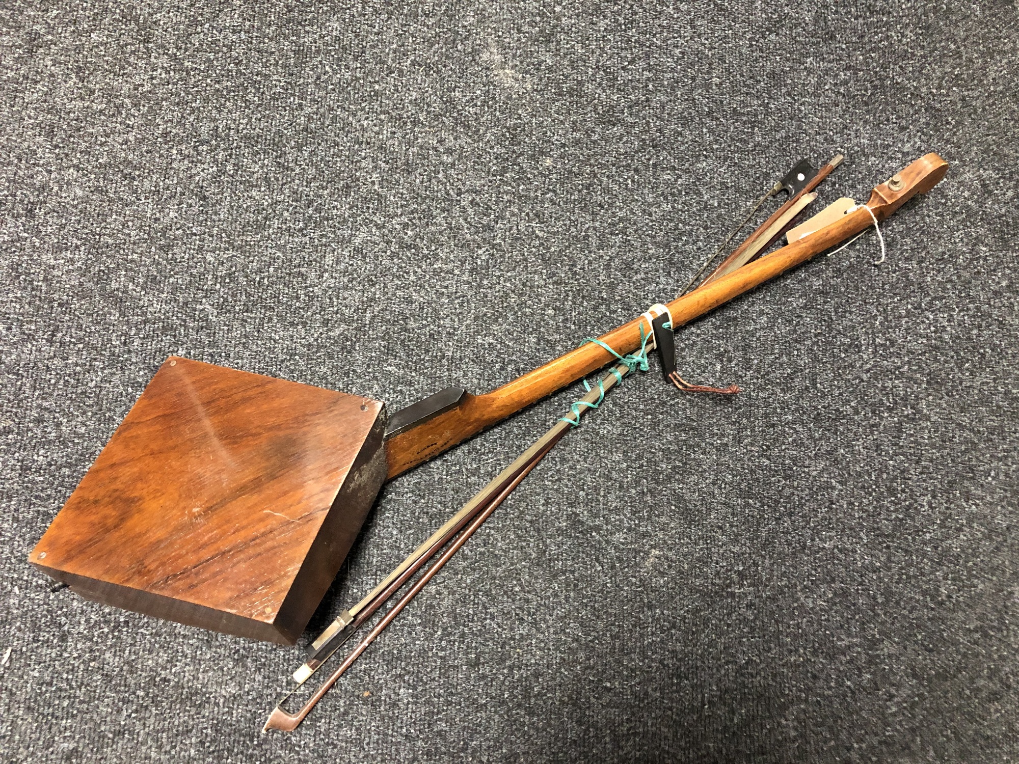 A late 19th century single stringed instrument with bows, - Image 8 of 10