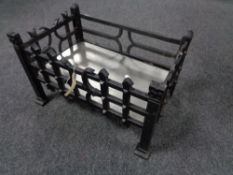 A cast iron fire basket