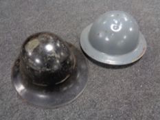 Two 20th century military helmets