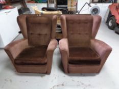 A pair of mid 20th century wing back armchairs (possibly G Plan)