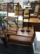 A 20th century folding beech child's chair and a teak two tier trolley and two smoker's stands
