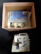 A Bernina Bernette over locking sewing machine with pedal CONDITION REPORT: Postage