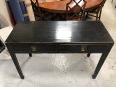 A Chinese style lacquered elm two drawer hall table,