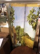 A three way folding room divider depicting a sunflower field