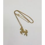 A 9ct gold horse pendant on chain, 1.6g.