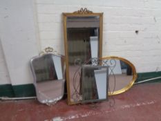 A gilt framed bevelled edge hall mirror together with three further mirrors