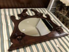 An Edwardian mahogany overmantel mirror