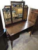 A mahogany dressing table with triple mirror (a/f), 113cm wide by 51cm deep by 151cm high overall.