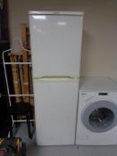 An Electrolux upright fridge freezer