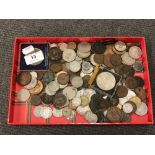 A quantity of British and foreign coins, commemorative crowns, etc.