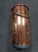 An early 20th century copper lidded water boiler,