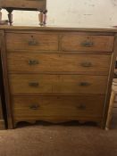 A 19th century inlaid mahogany five drawer chest