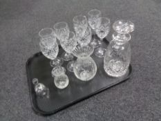 A tray of lead crystal to include eight wine glasses, decanter and stopper,