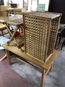 A teak lattice storage box and folding table together with a refectory coffee table