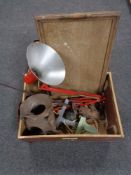 A vintage projector case containing a wooden twin handled serving tray,