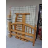 A Willis & Gambier 5' pine bed frame,