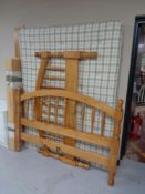 A Willis & Gambier 5' pine bed frame,