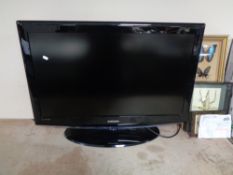 A Samsung 37 inch LCD TV with remote