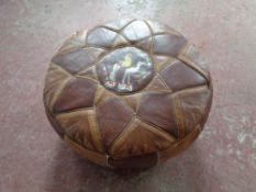 A Moroccan style leather footstool