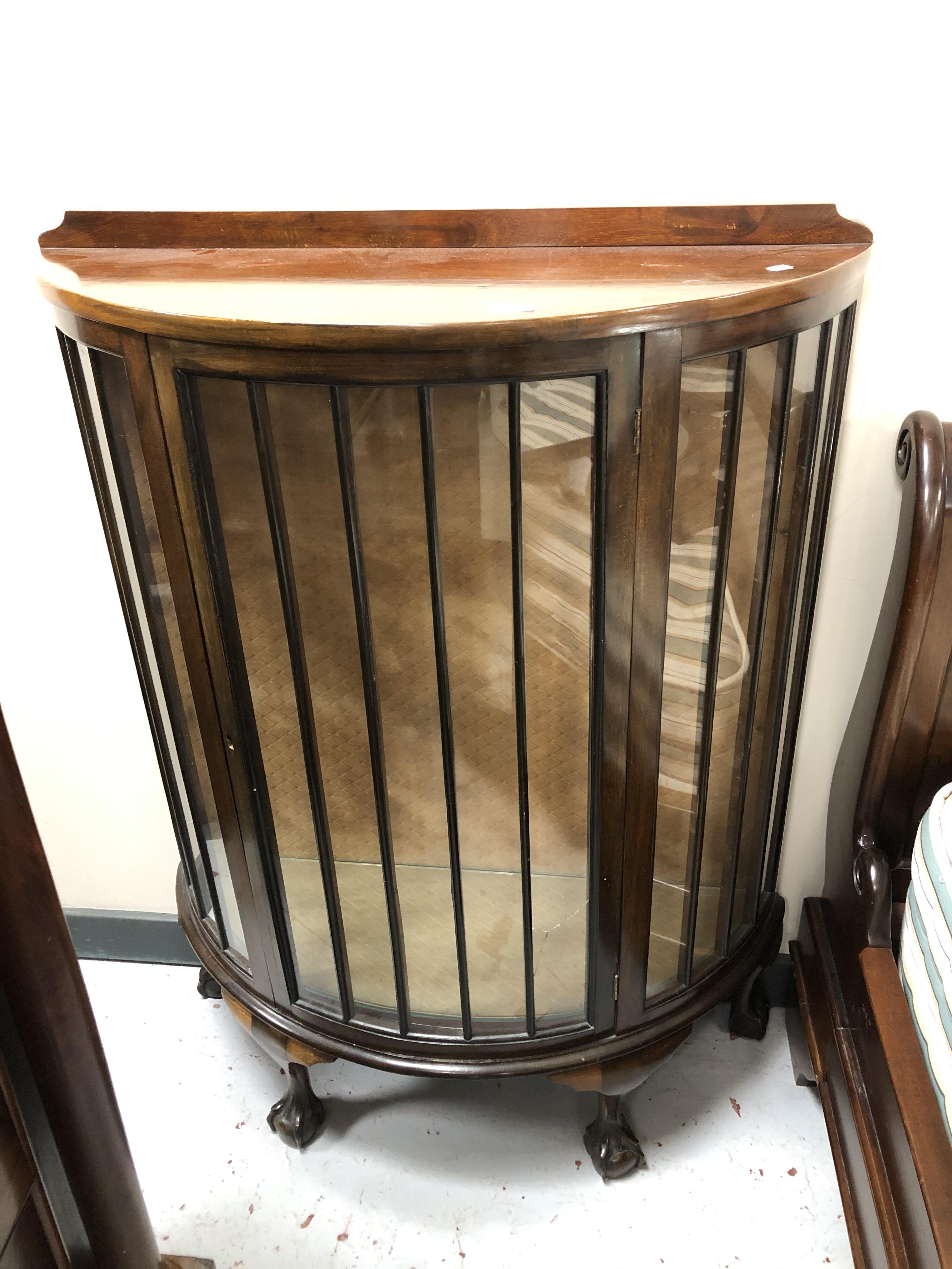 A 1930's mahogany display cabinet on claw and ball feet (a/f) CONDITION REPORT: