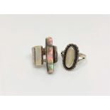 Two silver and abalone dress rings.