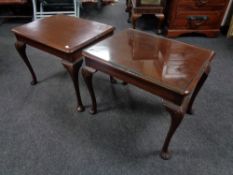 A pair of lamp tables on cabriole legs