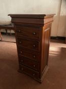 A reproduction six drawer narrow chest, 65c wide by 48cm deep by 126cm high.
