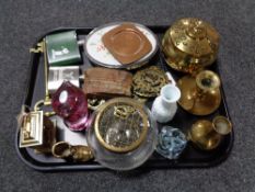 A tray of horse brasses and brass key, miniature brass carriage clock, paperweights,