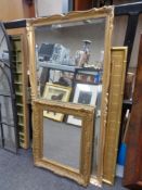 Three gilt framed mirrors,