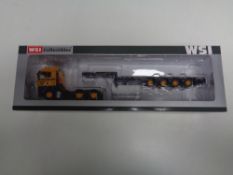 A WSI Collectables 1:50 scale Ainscough Man TGX XLX 6X4 with semi low loader 4 axle, boxed.