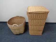 A 20th century wicker twin handled basket and a laundry basket