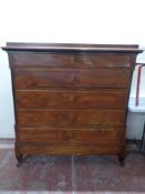 A 19th century elm and pine five drawer chest, 132cm wide by 60cm deep by 136cm high.