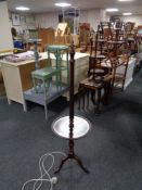 A stained beech wood standard lamp/wine table