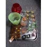 A tray of mainly 20th century glass ware including coloured glass glasses, decanter,