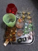 A tray of mainly 20th century glass ware including coloured glass glasses, decanter,