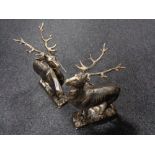 Two cast iron deer figures