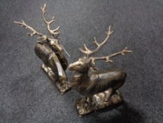 Two cast iron deer figures