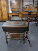 An oak flap sided two tier tea trolley together with a mahogany torchere