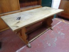 An antique oak refectory dining table