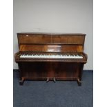 A walnut cased overstrung piano by Godfrey of London