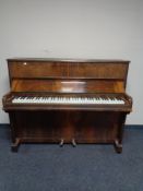 A walnut cased overstrung piano by Godfrey of London