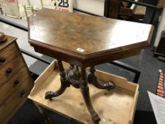 A Victorian inlaid mahogany hexagonal turnover top card table on pedestal support