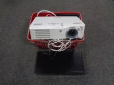 A crate of Panasonic PT-AX100E projector, a quantity of cabling,